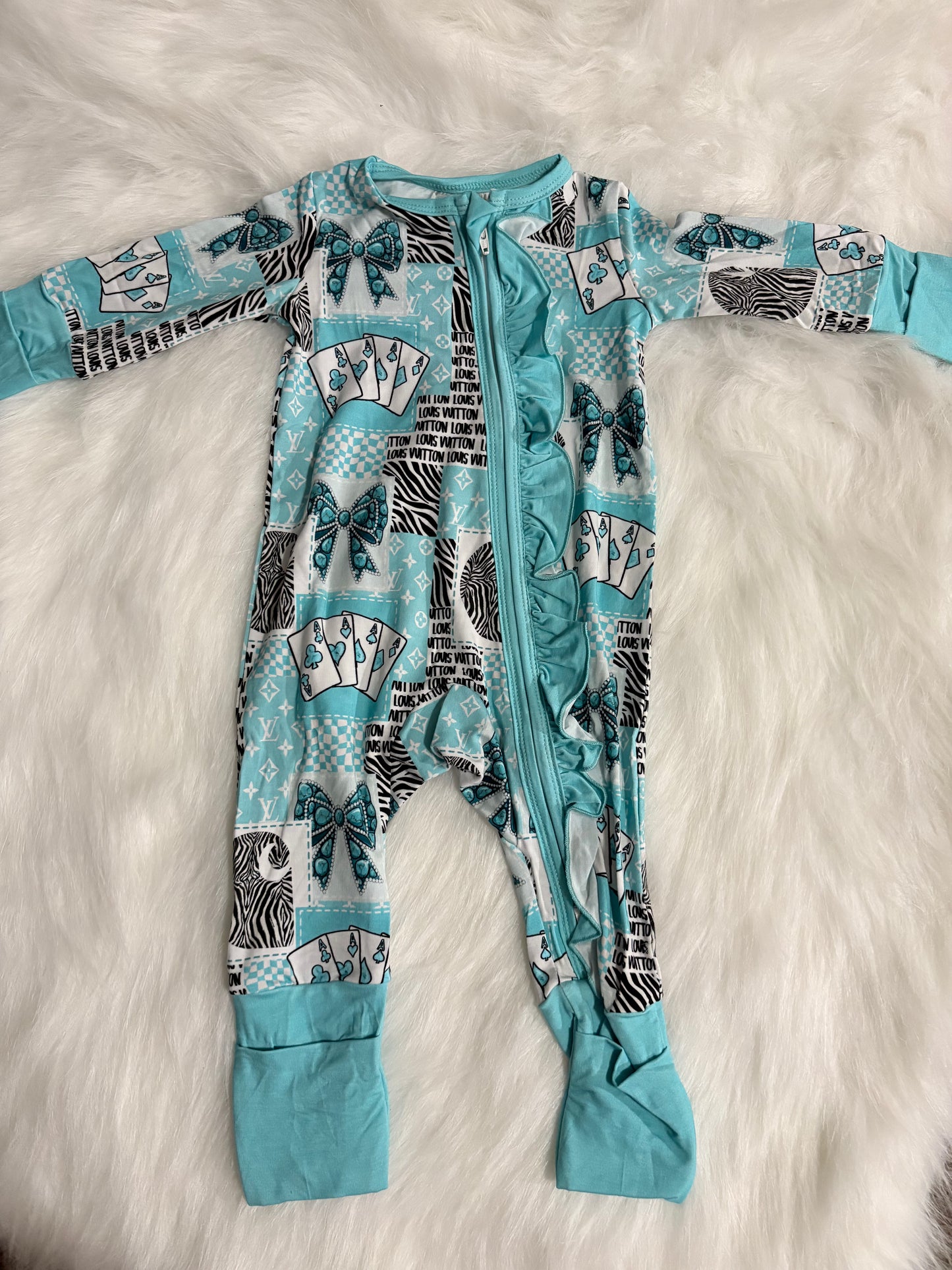 Dripped in turquoise ruffle zippy